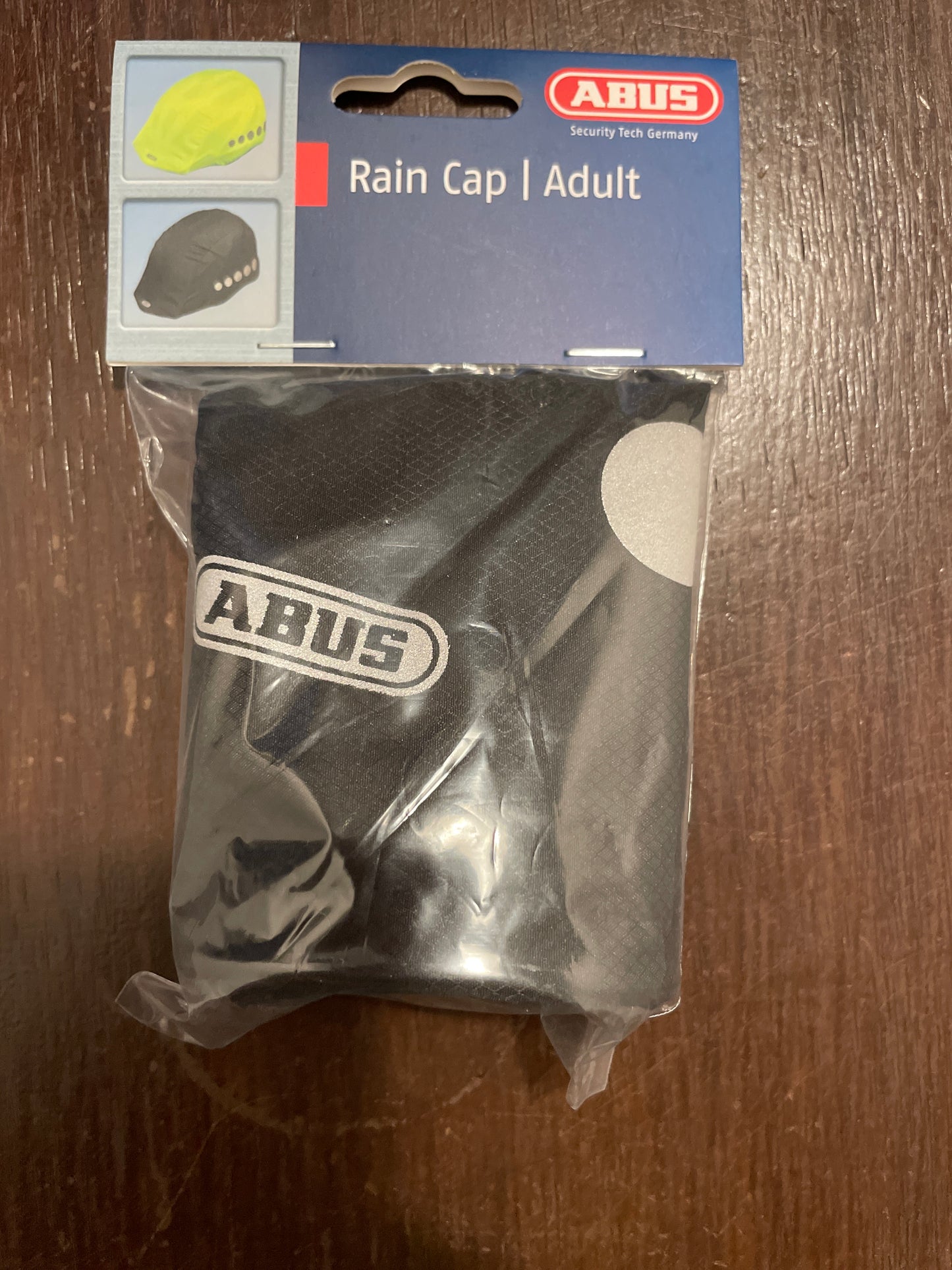 ABUS - Regenkappe / Regenschutz / Helmüberzug - Farbe: Schwarz mit Reflektoren